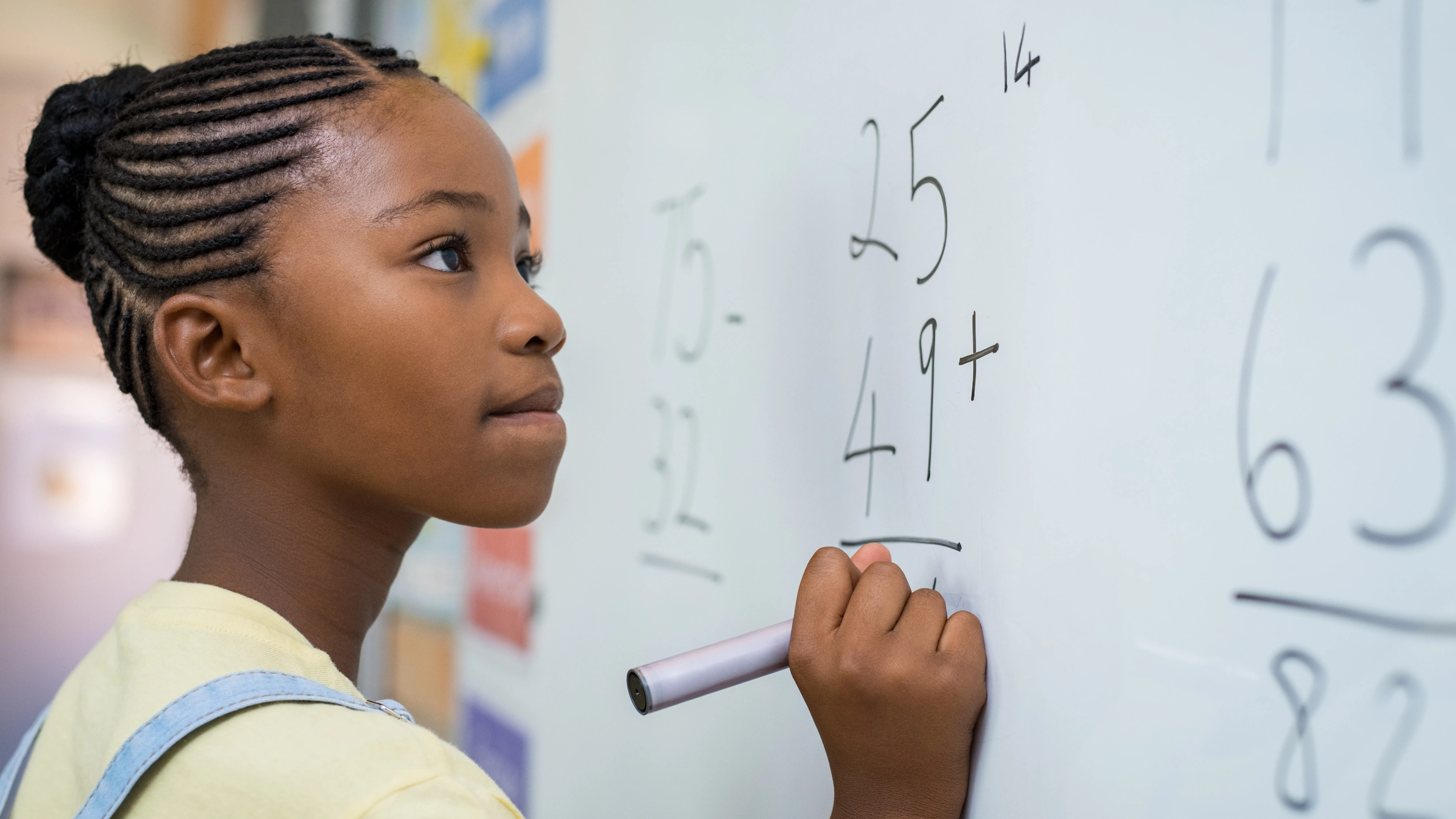 Students learning in a classroom.